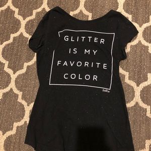 A black children’s justice tee shirt